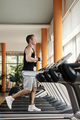 Sportsman Running on Treadmill - PhotoDune Item for Sale
