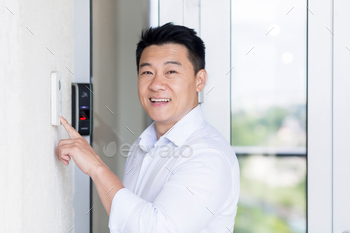 office, uses doorbell with fingerprint lock, man