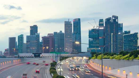 Traffic view with background Singapore landmark financial business district with skyscraper,