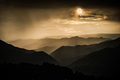 banner of mountain peaks in beautiful stormy sunset light - PhotoDune Item for Sale
