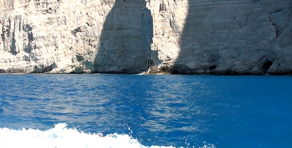Floating Along Rocks In Blue Bay 2 alt