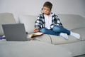 Boy is on online training in a cozy home environment - PhotoDune Item for Sale