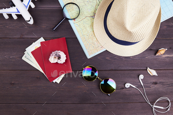 Accessories for travelers: passport, money, card, hat, sunglasses, headphones