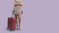 Elegant woman traveling with a trolley case - PhotoDune Item for Sale