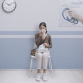 Young woman with cold and flu at the hospital - PhotoDune Item for Sale