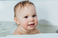 Happy child bathing in bath - PhotoDune Item for Sale