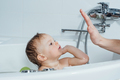 Kid taking bath, child bathing in bathtub, little baby playing with water - PhotoDune Item for Sale