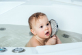 Kid taking bath. Child bathing in bathtub. Little baby playing with water - PhotoDune Item for Sale
