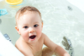 Kid taking bath. Child bathing in bathtub. Little baby playing with water. - PhotoDune Item for Sale