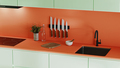 Kitchen countertop in bright orange and green colours with knives, stove and sink, decoration - PhotoDune Item for Sale