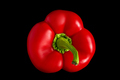 Sweet red bell pepper on a black background. - PhotoDune Item for Sale