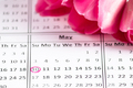 Mothers Day. Calendar with a marked date and pink flowers. A reminder of the holiday. - PhotoDune Item for Sale
