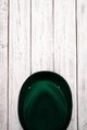 Happy St. Patrick's Day. Leprechaun hat and clover shamrock on a light wooden background. - PhotoDune Item for Sale