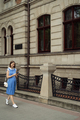 Pregnant woman walking through the city using a smartphone - PhotoDune Item for Sale