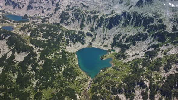 Aerial View of a Lake in the Pirin Mountains with Blue Clear Water