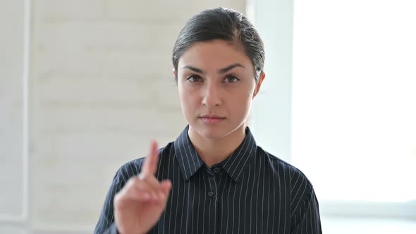 Young Indian Woman Showing No Sign By Finger