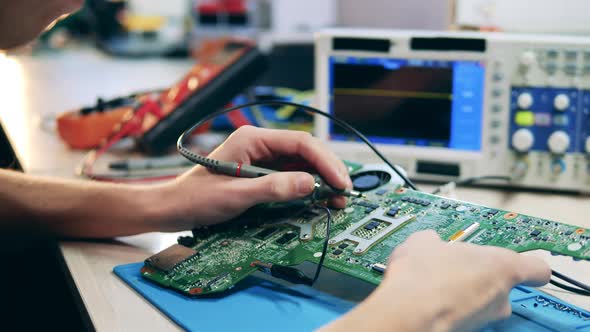 Microcircuits Are Being Soldered During Maintenance