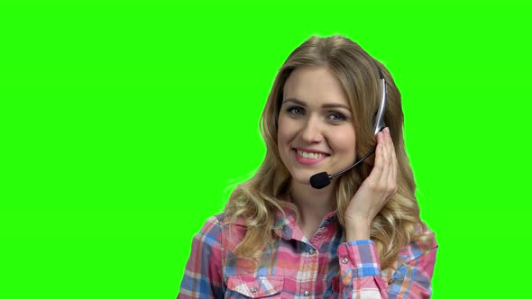 Portrait of Beautiful Call Center Operator on Green Screen