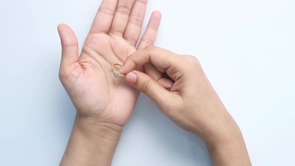 Woman Hand with Wedding Ring, Top View 