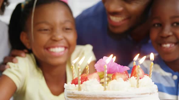 Family celebrating birthday