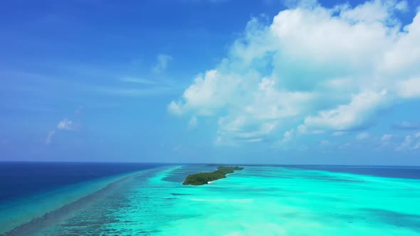 Aerial top view scenery of luxury island beach trip by shallow lagoon with white sand background of 