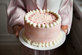 Woman holding delicious pink cake with text Happy birthday to me, closeup - PhotoDune Item for Sale
