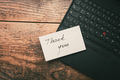 Closeup of Thank You sticky note message on laptop - PhotoDune Item for Sale