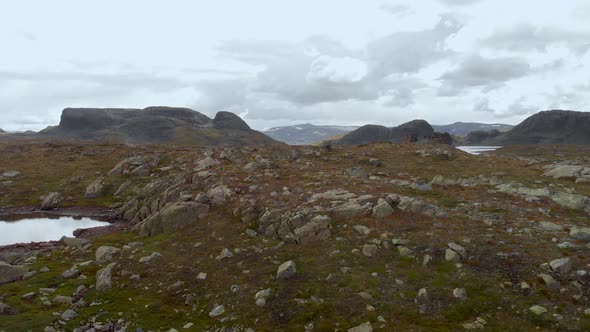 Hardangervidda glacier meltwater lakes and wilderness in Norway subarctic, aerial