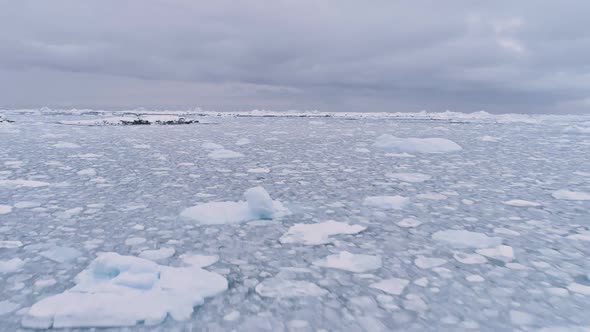 Aerial Flight Over Frozen Ice Ocean. Antarctica