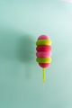 Colored ice cream popsicle on a pastel mint background. Minimal summer concept - PhotoDune Item for Sale