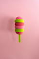 Colored ice cream popsicle on a pastel pink background. Minimal summer concept - PhotoDune Item for Sale