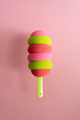 Colored ice cream popsicle on a pastel pink background. Minimal summer concept - PhotoDune Item for Sale