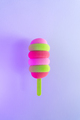 Colored ice cream popsicle on a pastel purple background. Minimal summer concept - PhotoDune Item for Sale