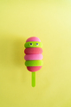 Colored ice cream popsicle on a pastel yellow background. Minimal summer concept - PhotoDune Item for Sale