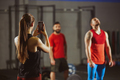 Woman taking picture with smartphone in gym. - PhotoDune Item for Sale