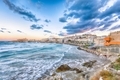 Breathtaking view of historic center and promenade of the city of Vieste at sunset - PhotoDune Item for Sale