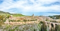 Breathtaking view on Gravina in Puglia ancient town, bridge and canyon at sunris - PhotoDune Item for Sale