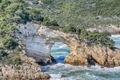 Scenic view on Gargano coast: San Felice arch (Architello). Vieste, San Felice arch rock bay - PhotoDune Item for Sale