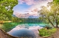 Incredible view of sunset over Fusine lake with Mangart peak on background. - PhotoDune Item for Sale