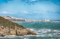 Above the cliffs at the coastline of Vieste. Summer rocky sea coast Baia Di Campi Vieste on the  - PhotoDune Item for Sale