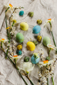 Rustic easter flat lay. Stylish easter eggs and blooming spring flowers on rustic table - PhotoDune Item for Sale