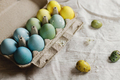 Stylish easter eggs and blooming cherry branch on rustic table. Happy Easter! - PhotoDune Item for Sale