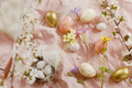 Happy Easter! Stylish easter eggs and blooming spring flowers on pink linen fabric - PhotoDune Item for Sale