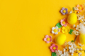 Happy Easter! Easter flat lay with eggs, colorful flowers, feathers and blooming cherry - PhotoDune Item for Sale