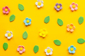 Stylish colorful flowers flat lay on yellow background. Modern festive holiday banner - PhotoDune Item for Sale
