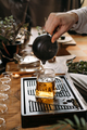 Traditional tea ceremony - pouring chinese oolong in glass cup - PhotoDune Item for Sale