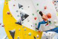 Rock climber woman looking at smartphone. - PhotoDune Item for Sale