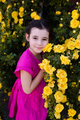 Cute smiling kid girl with rose flowers in park outdoor - PhotoDune Item for Sale