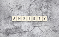 Anxiety word tiles on a cracked concrete background - PhotoDune Item for Sale
