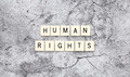 Human Rights word tiles on a cracked concrete background - PhotoDune Item for Sale
